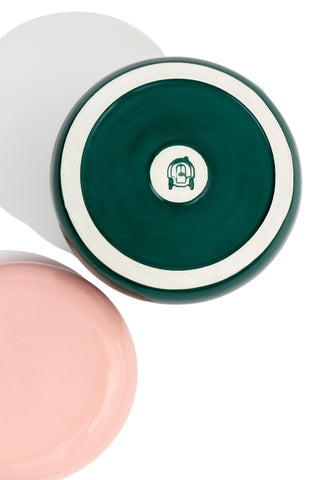 karavan clothing fashion fall winter 25 homecoming homeware collection ceramic jar dark green pink