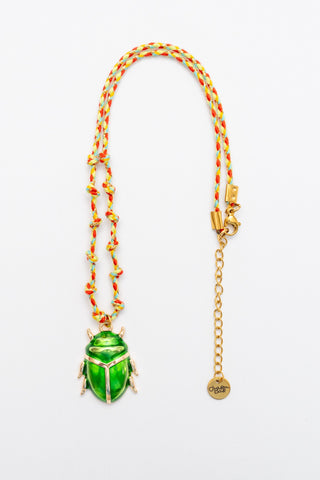 karavan clothing fashion spring summer 26 nai vera's day collection scarab necklace golden