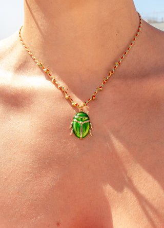 karavan clothing fashion spring summer 26 nai vera's day collection scarab necklace golden