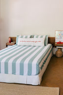 karavan clothing planet homeware collection spring summer 25 fitted sheet pistachio stripes