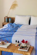 karavan clothing planet homeware collection spring summer 25 flat sheet four blues stripes