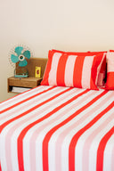 karavan clothing planet homeware collection spring summer 25 fitted sheet pink red stripes
