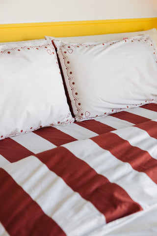 karavan clothing planet homeware collection fall winter 25 26 pillow case set hearts burgundy stripes