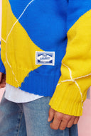 karavan men fall winter 26' collection xavier knitted pullover red blue yellow