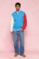 karavan men fall winter 26' collection leandro varsity jacket light blue ivory red