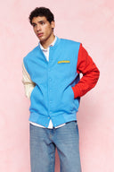 karavan men fall winter 26' collection leandro varsity jacket light blue ivory red