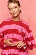 karavan fall winter 26' collection paloma dress pink red lines