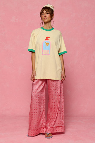 karavan clothing fashion planet homeware spring summer 26 nai collection sunscreen tee yellow energy