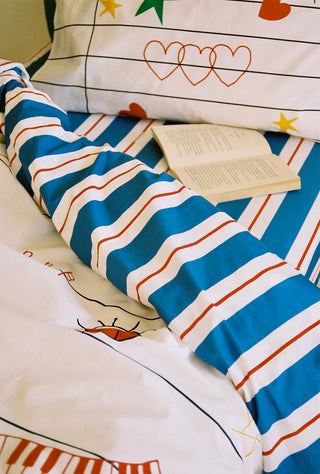 karavan clothing fashion fall winter 25 homecoming rookies collection kid duvet cover notebook blue red stripes
