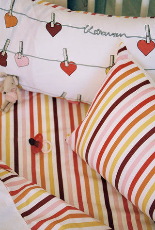 karavan clothing fashion fall winter 25 homecoming rookies collection baby pillow case hearts multicolor stripes