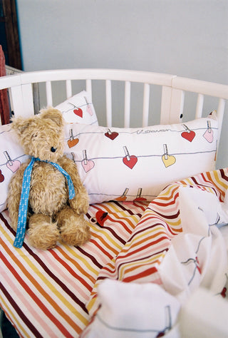 karavan clothing fashion fall winter 25 homecoming rookies collection baby pillow case hearts multicolor stripes