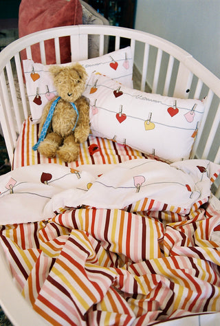 karavan clothing fashion fall winter 25 homecoming rookies collection baby pillow case hearts multicolor stripes