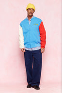 karavan men fall winter 26' collection leandro varsity jacket light blue ivory red