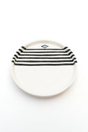 karavan planet fall winter 26' collection serving plate black white stripes