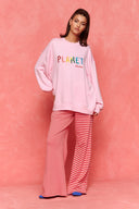 karavan loungewear planet fall winter 26' collection mellow trousers pink red lines