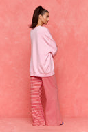 karavan loungewear planet fall winter 26' collection mellow trousers pink red lines