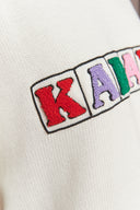 karavan fall winter 26' collection thalia knitted sweater white logo