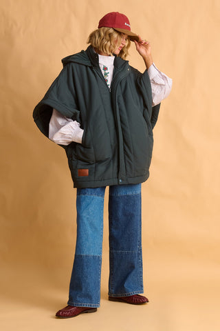 karavan clothing fashion fall winter 25 homecoming collection zuri cape green