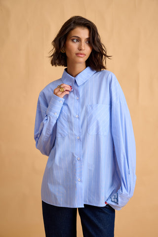 karavan clothing fashion fall winter 25 homecoming collection ariana shirt blue