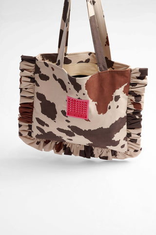 karavan clothing fashion fall winter 25 homecoming collection kelly bag ivory splash