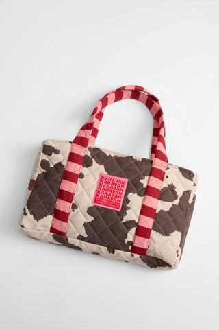 karavan clothing fashion fall winter 25 homecoming collection alexia handbag cow stripes