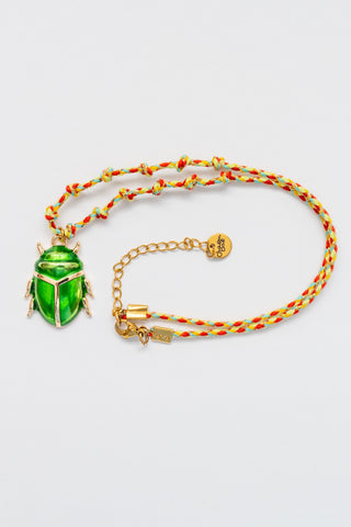 karavan clothing fashion spring summer 26 nai vera's day collection scarab necklace golden