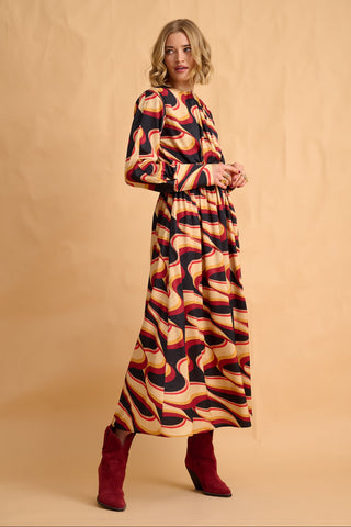 karavan clothing fashion fall winter 25 homecoming collection cate dress abstract bordeaux yellow