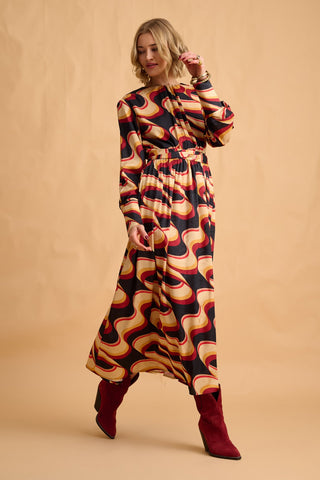 karavan clothing fashion fall winter 25 homecoming collection cate dress abstract bordeaux yellow