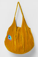 karavan loungewear planet fall winter 26' collection youreye bag orange gold