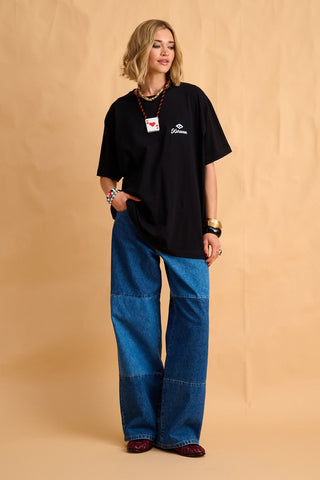 karavan clothing fashion fall winter 25 homecoming collection dino tee black eye