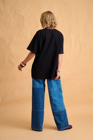 karavan clothing fashion fall winter 25 homecoming collection dino tee black eye