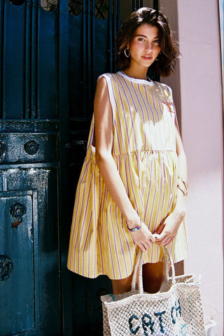 karavan clothing fashion spring summer 26 nai special issue collection matenia dress yellow stripes
