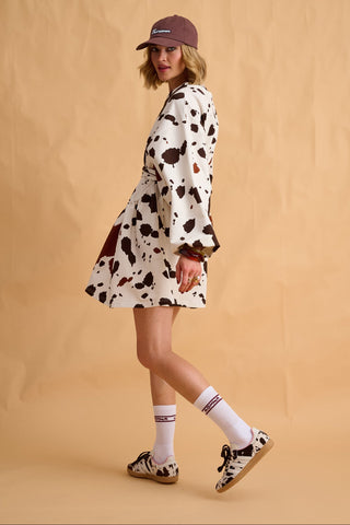 karavan clothing fashion fall winter 25 homecoming collection hannah mini dress black white cow