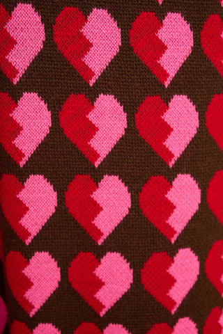 karavan clothing fashion fall winter 25 homecoming collection jadis knitted trousers black red hearts 