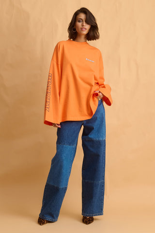 karavan clothing fashion fall winter 25 homecoming collection jutte longsleeve orange