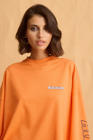karavan clothing fashion fall winter 25 homecoming collection jutte longsleeve orange
