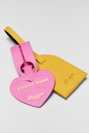 karavan clothing fashion spring summer 26 nai collection luggage tag yellow leather