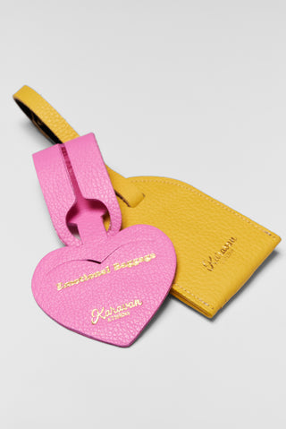 karavan clothing fashion spring summer 26 nai collection luggage tag yellow leather