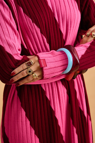 karavan clothing fashion fall winter 25 homecoming collection nisha knitted dress pink red stripes