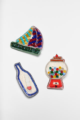 karavan clothing fashion spring summer 26 nai collection gumball bottle pins
