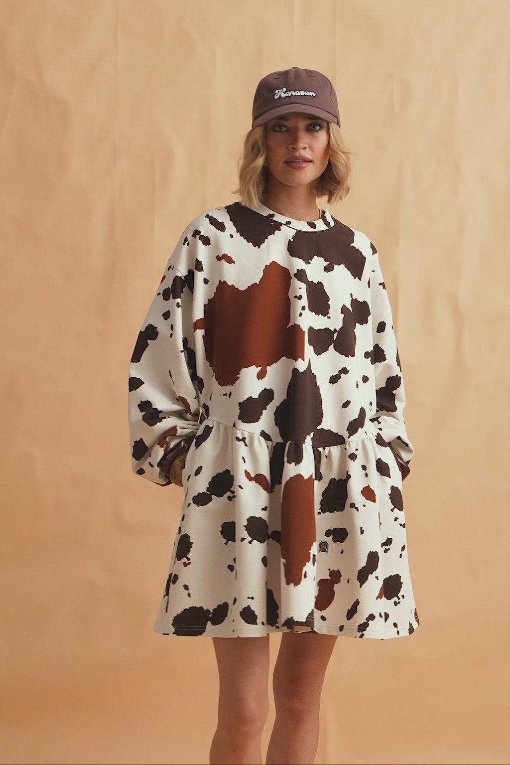 karavan clothing fashion fall winter 25 homecoming collection hannah mini dress black white cow