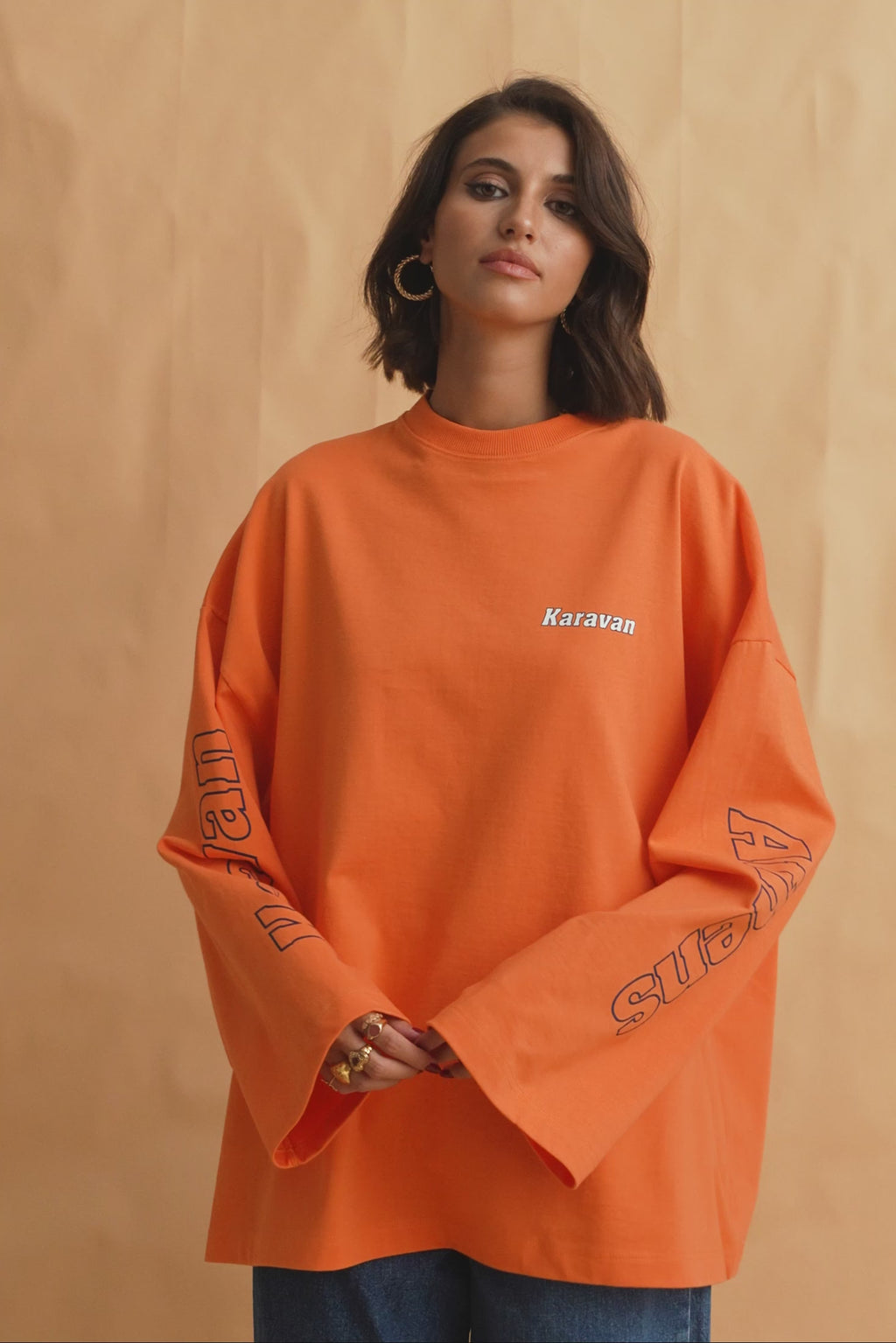 karavan clothing fashion fall winter 25 homecoming collection jutte longsleeve orange