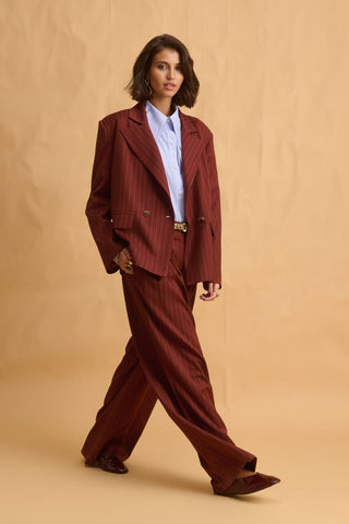 karavan clothing fashion fall winter 25 homecoming collection kaida trousers brown white stripes