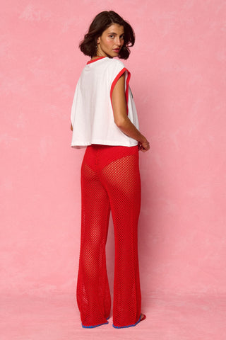 karavan clothing fashion spring summer 26 nai weekendwear collection ruby knitted trousers red blue