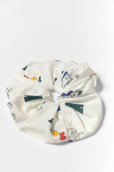 karavan fall winter 26' collection tribe scrunchie logos white