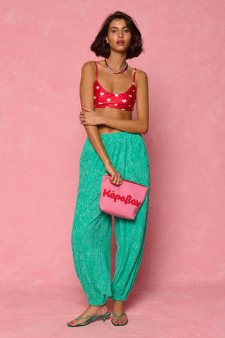 karavan clothing fashion spring summer 26 nai weekendwear collection pink pouch logo